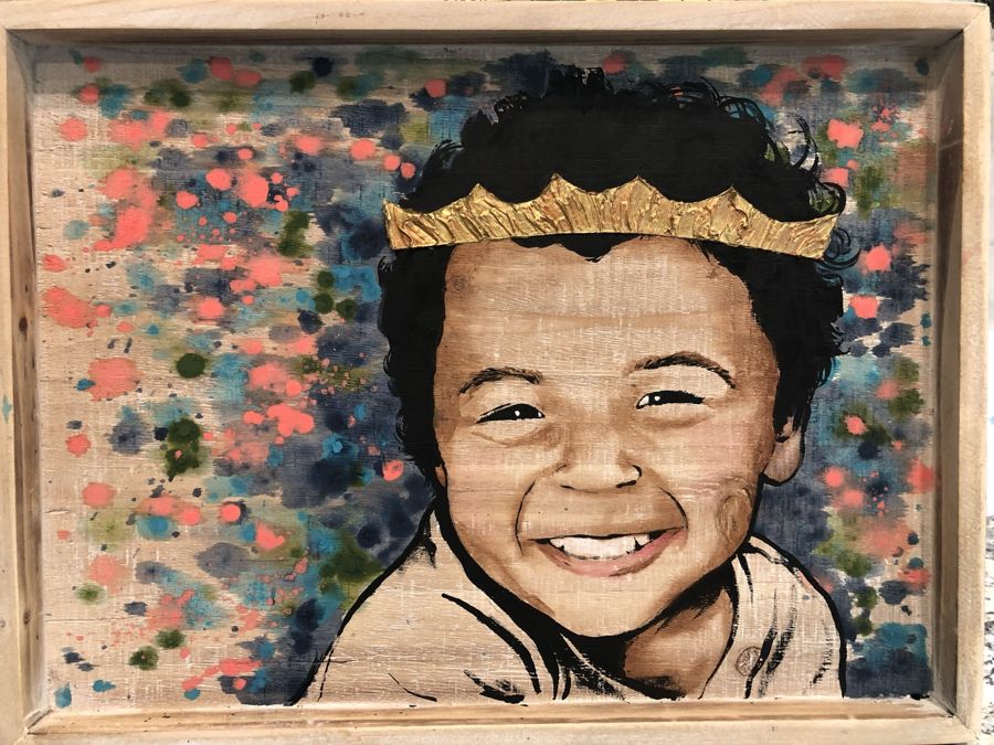 Boy with a gold crown, framed